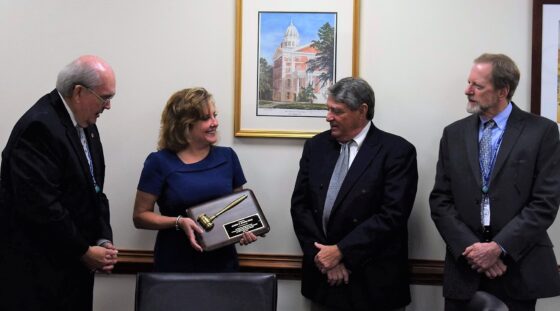 L to R: Chairman Pearce, Dr. Evans, Mr. John H. Magill, Interim State Director Mark W. Binkley, JD
