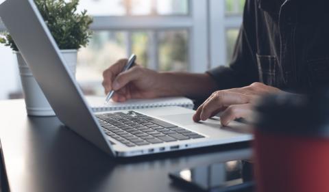 Person using a laptop computer image